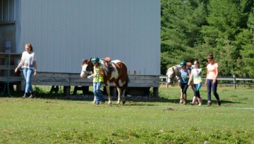 Campers enjoying horseback riding