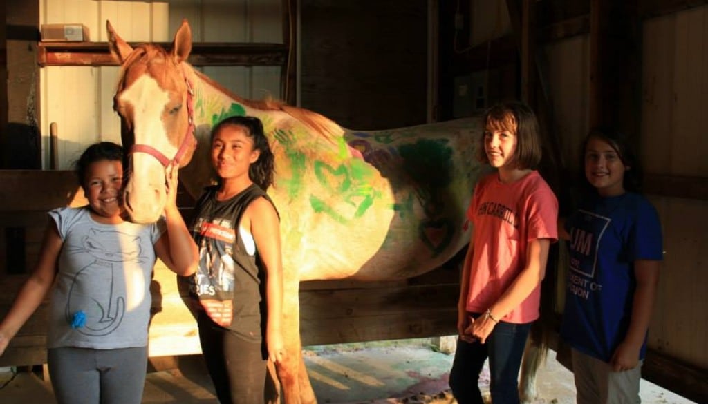 Campers with horse at WeHaKee Camp for Girls