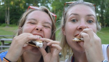 Campers eating smores