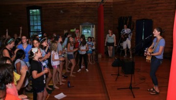 singing at camp with everyone