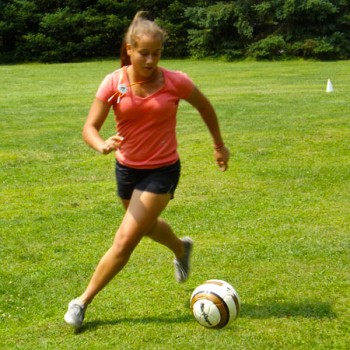 Playing soccer at WeHaKee Camp for Girls