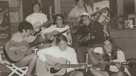 Singing and playing guitars at WeHaKee Camp for Girls