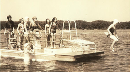 Campers jumping into Hunter Lake while at WeHaKee Camp for Girls