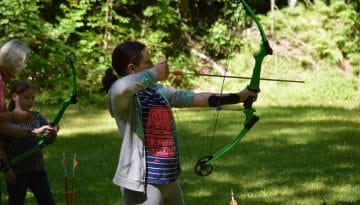 Archery practice at WeHaKee Camp for Girls.