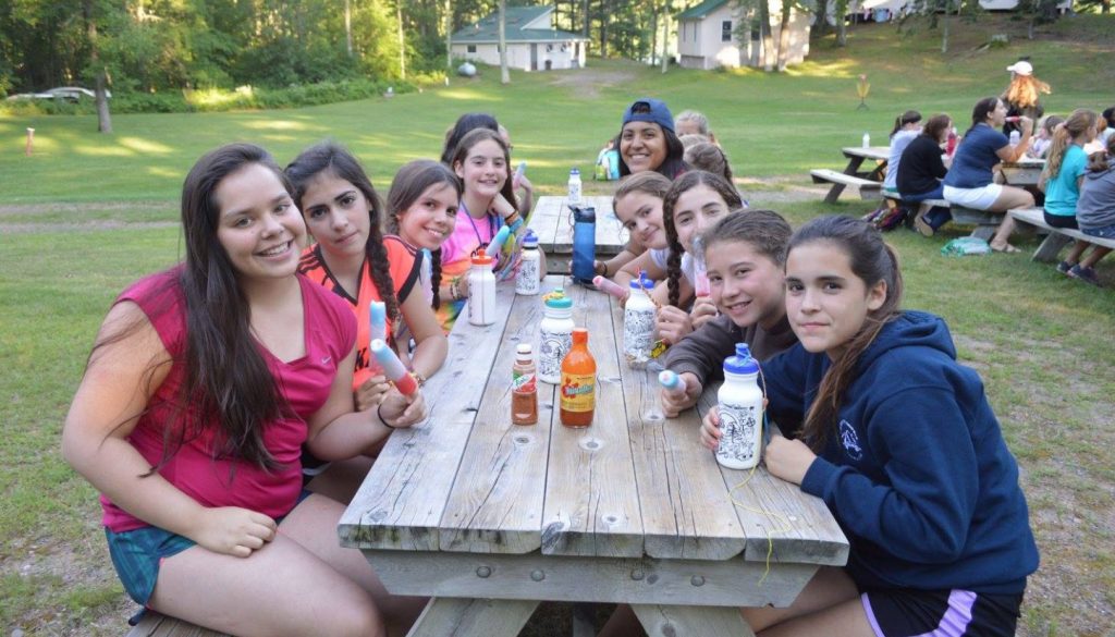 WeHaKee campers eating Popsicles and drinking refreshing beverages