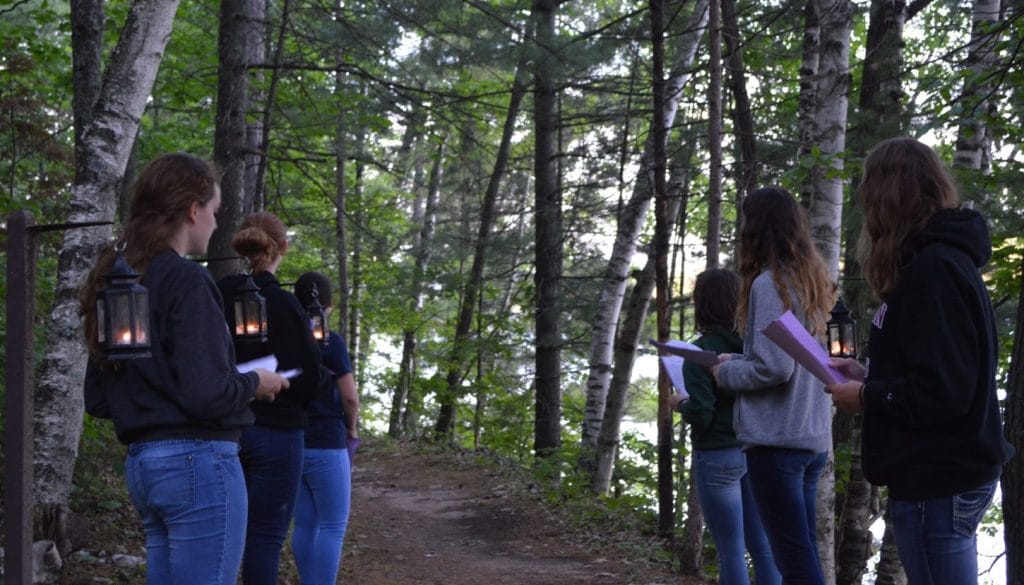 Campers waiting on a trail at WeHaKee Camp for Girls.