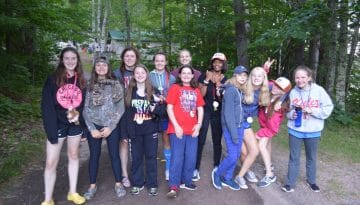 Campers getting ready to hike down the Chickagami trail at WeHaKee Camp for Girls.