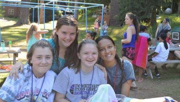 WeHaKee Camp for Girls comper friends hanging out during lunch.