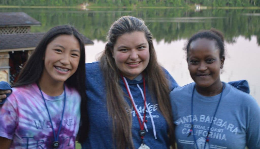 WeHaKee Camp for Girls staff group photo next to Hunter Lake.