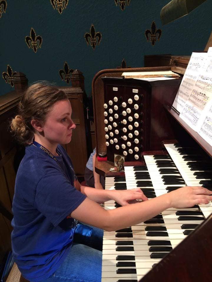 WeHaKee Camp for Girls Staff: Katherine playing on the piano.