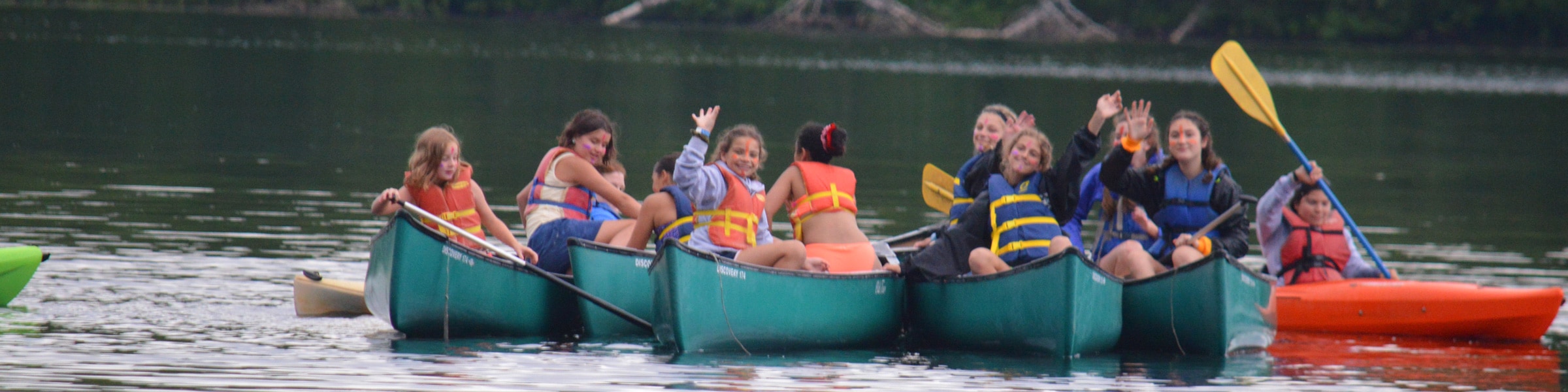 Campers canoeing on Hunter Lake at WeHaKee Camp for Girls