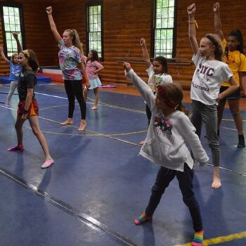 Girls participating in a dance performance at WeHaKee Camp for Girls