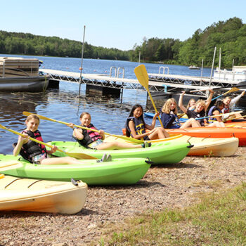 Kayaking class on Hunter Lake at WeHaKee Camp for Girls