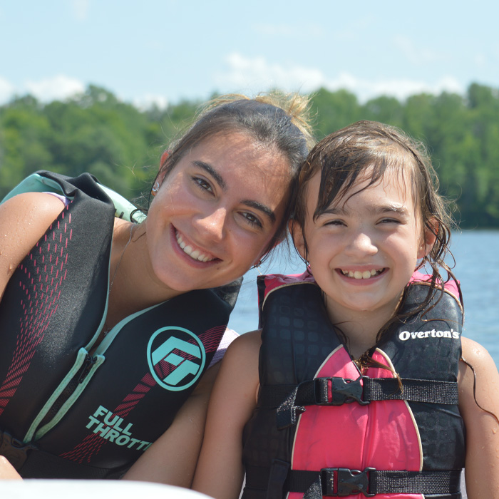 wehakee-camp-girls-winter-wisconsin-summer-camper-counselor-boating-hunter-lake-life-jackets-700x700