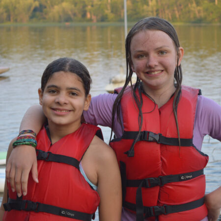 wehakee-camp-girls-winter-wisconsin-summer-campers-boating-hunter-lake-life-jackets-700x700